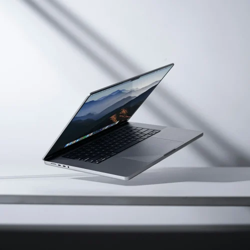 MacBook pro in the air